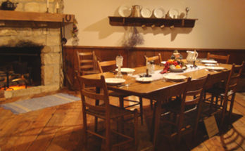 1856 Pioneer dining room with fireplace, Steamboat Arabia, Kansas City.