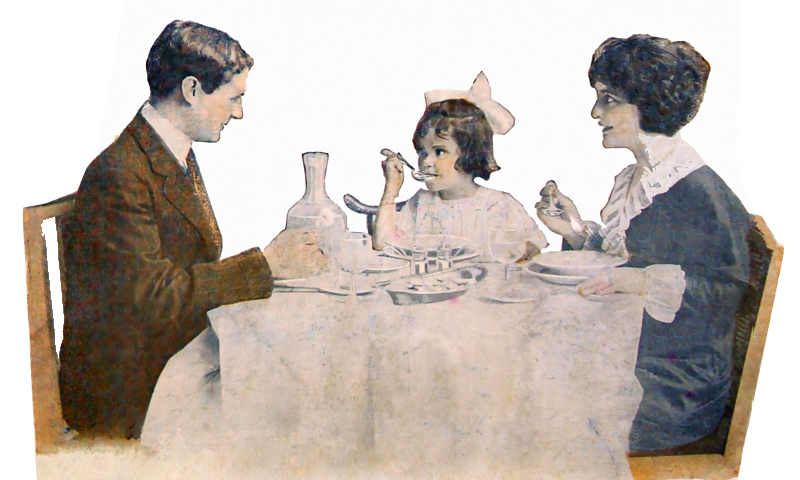 Family dining at the table, huband, wife, and little girl. They're eating a meal containing oysters.