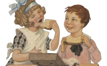 Boy and a girl eating sandwiches.