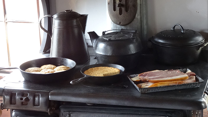 historic formulas for stove blacking. Photo of cast iron stove with breakfast from the Florida State Fair historic village. (c)